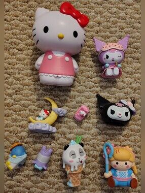 Sanrio Multi-Figure Set with Hello Kitty in Pink Dress and Red Bow